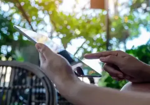 Person holding tablet